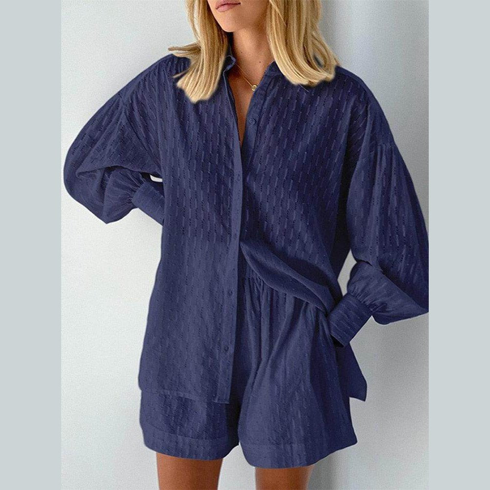 VacationGrabs women's outfit featuring a lantern sleeve shirt and shorts in a stylish navy color