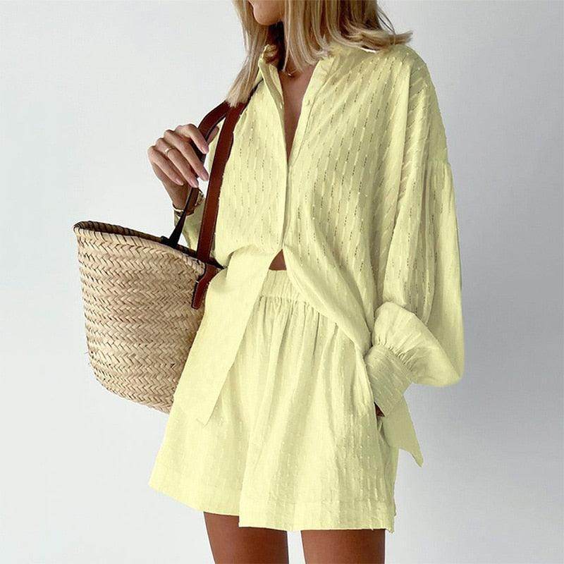 Light yellow lantern sleeve shirt and shorts set with stylish tote bag for summer outings