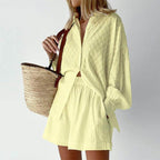 Light yellow lantern sleeve shirt and shorts set with stylish tote bag for summer outings