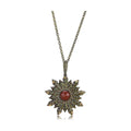 Vintage chain pendant jewelry featuring a decorative star design with a red stone center