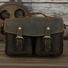 Vintage leather camera bag with dual front pockets and sturdy handle for photography enthusiasts