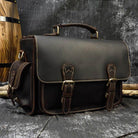 Vintage leather camera bag with adjustable straps and sturdy buckles for photographers on the go