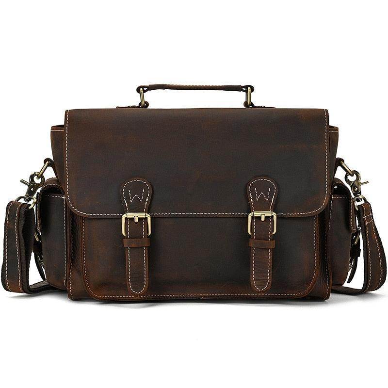 Vintage leather camera bag with adjustable straps and multiple compartments for photographers