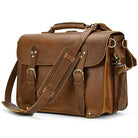 Vintage leather laptop bag with adjustable shoulder strap and sturdy handles for professional use