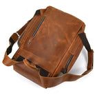 Vintage leather travel backpack in brown with durable straps and multiple compartments