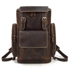 Vintage leather travel backpack with dual side pockets and adjustable straps for stylish adventures