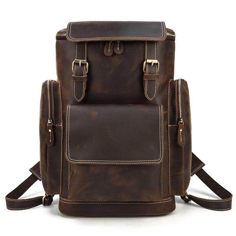 Vintage leather travel backpack with dual side pockets and adjustable straps for stylish adventures