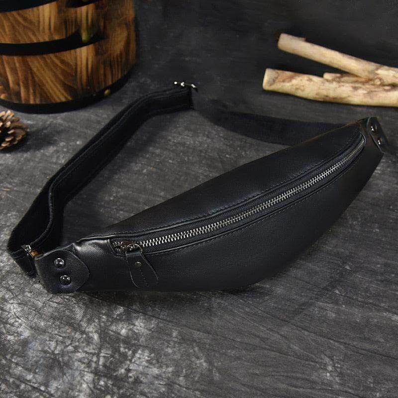 Vintage leather waist bag in black with a sleek design and zipper closure for stylish storage