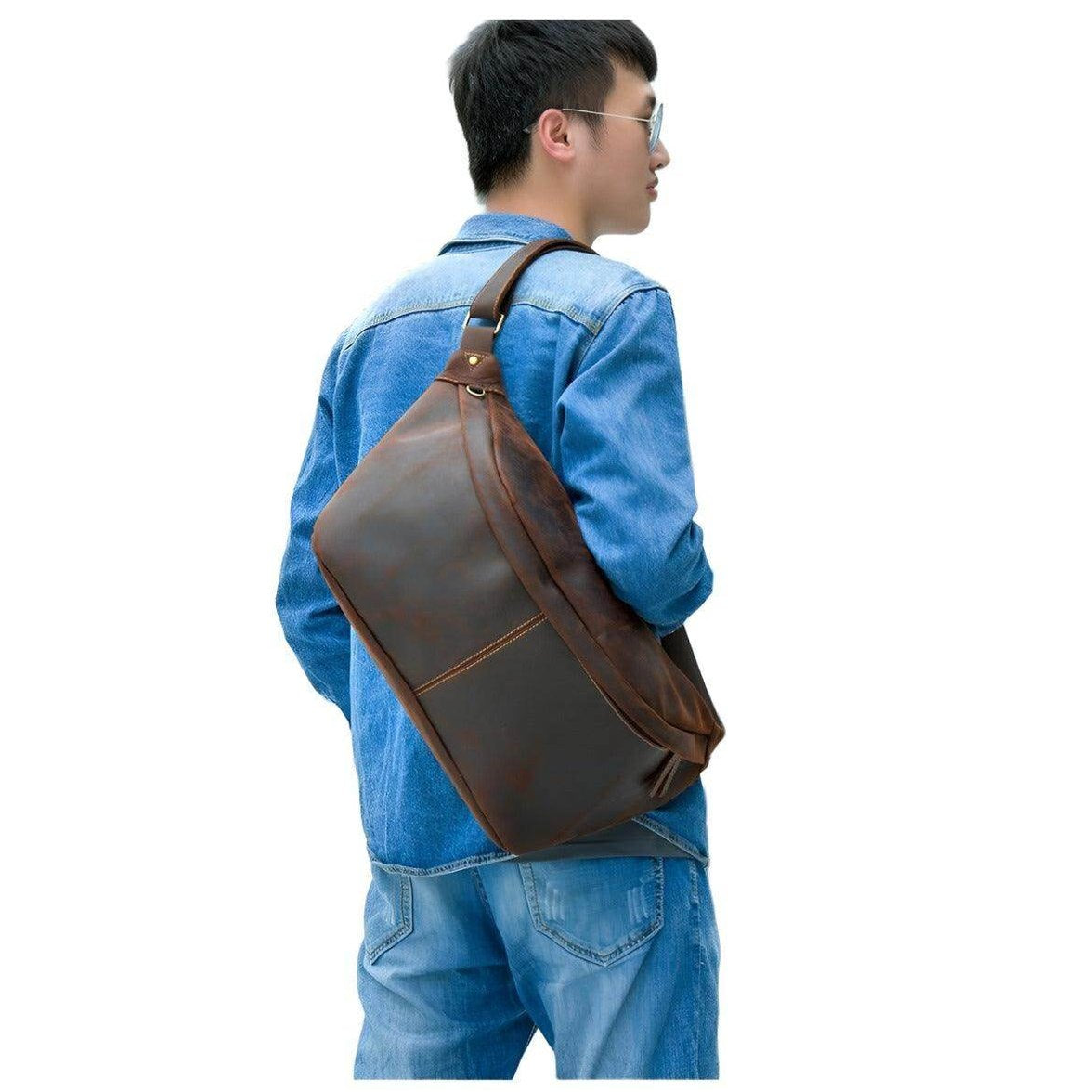 Man wearing a vintage leather waist bag in brown with a stylish and functional design