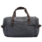 Gray weekender outdoor duffel bag with sturdy handles and zipper pockets for travel convenience