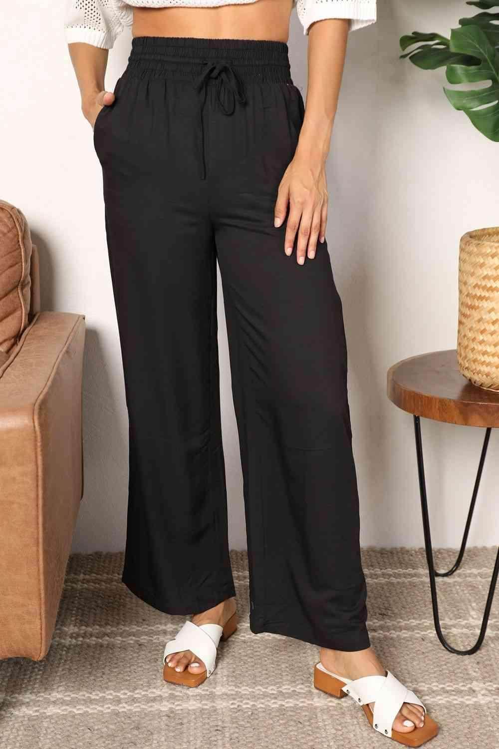 Trendsi wide leg vacation pants in black with an elastic waistband for comfortable summer style