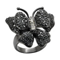 Elegant womens cobalt black ring featuring a butterfly design with sparkling stones