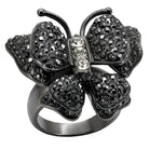 Elegant womens cobalt black ring featuring a butterfly design with sparkling stones