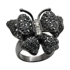 Elegant womens cobalt black ring featuring a butterfly design with sparkling stones