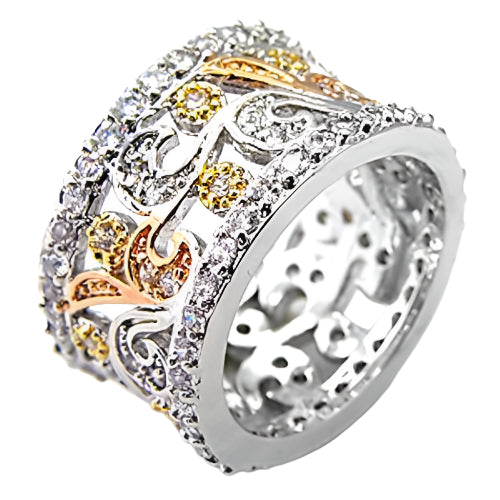 Stunning women's fashion brass ring with intricate silver and gold designs, adorned with sparkling stones.