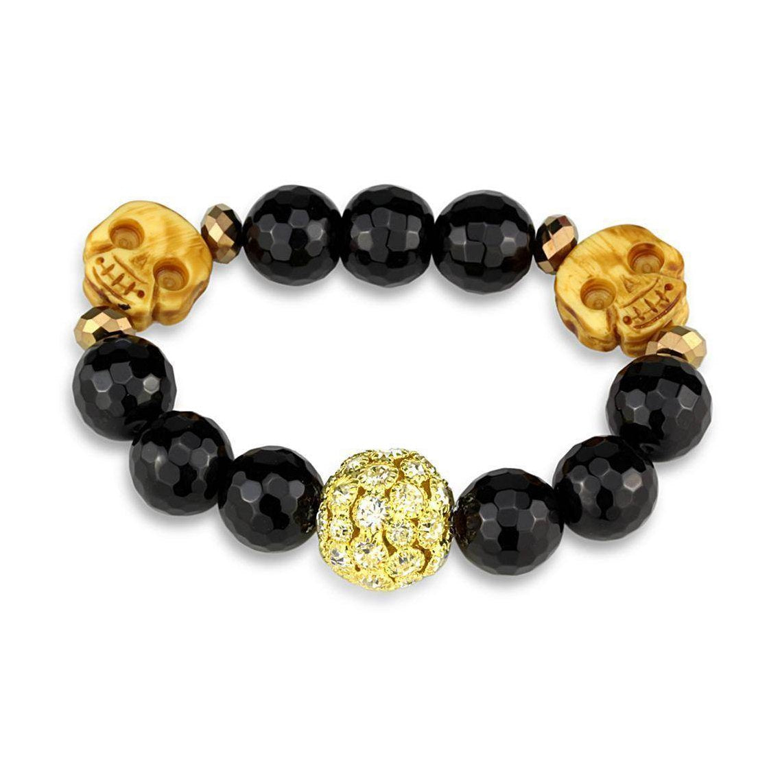 Unique women's gold brass bracelet featuring black beads and carved skull accents for a stylish look