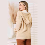 Trendsi woven long sleeve sweater in beige with a hood for a cozy and stylish look