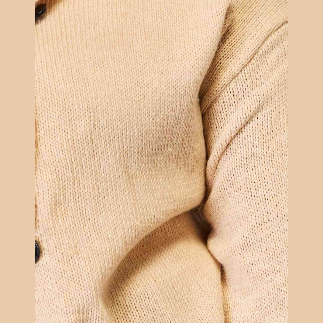 Beige woven long sleeve sweater with a relaxed fit and button details for casual wear