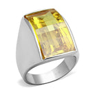 Elegant yellow gemstone cocktail ring featuring a large rectangular cut stone and a silver band