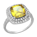 Elegant yellow topaz halo ring with sparkling diamond accents set in a silver band